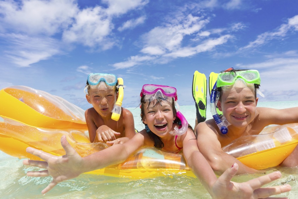 Three kids on a raft
