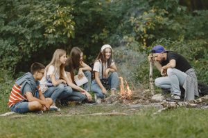 Groups of friends camping in the forest